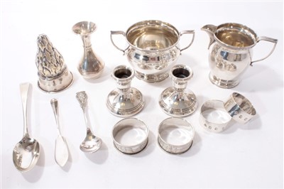 Lot 404 - Miscellaneous silver including dwarf candlesticks, cream jug and sugar bowl, table lighter etc