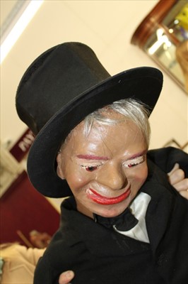 Lot 2841 - Papier mâché ventriloquist dummy in top hat and evening wear, c1920's.