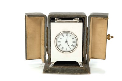 Lot 845 - Silver Carriage clock in leather travelling case