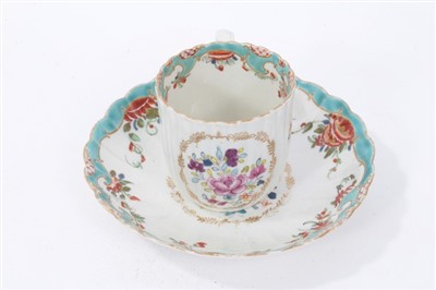 Lot 281 - Mid-18th century Worcester fluted cup and saucer with polychrome