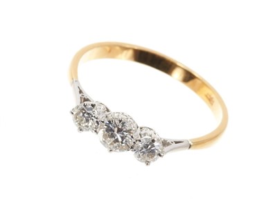 Lot 658 - Diamond three stone ring