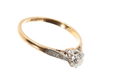 Lot 661 - Diamond single stone ring with an old cut diamond in claw setting with diamond set shoulders