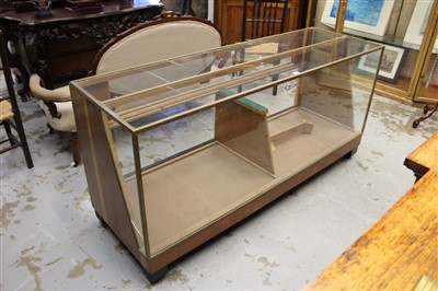 Lot 902 - Glass fronted shops display cabinet, rectangular outline with metal finish, 184cm wide x 62cm deep x 187cm high