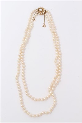 Lot 3250 - Cultured pearl two-strand necklace with 9ct gold clasp