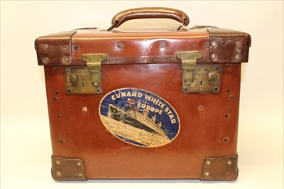 Lot 3142 - Good quality square leather fitted top hat case, travel labels include Cunard White Star and Union Castle Line South and East Africa, brush and stretcher