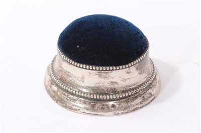 Lot 406 - Four silver and one silver plated pin cushions and hat pin holders (5)