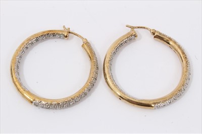 Lot 3211 - Pair gold (9ct) diamond set hoop earrings