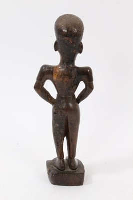 Lot 120 - Second quarter 20th century African carved wooden tribal figure