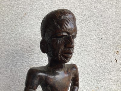Lot 120 - Second quarter 20th century African carved wooden tribal figure