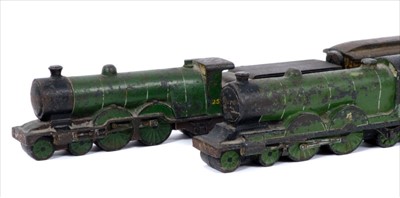 Lot 266 - Highly unusual group of painted iron train paperweights