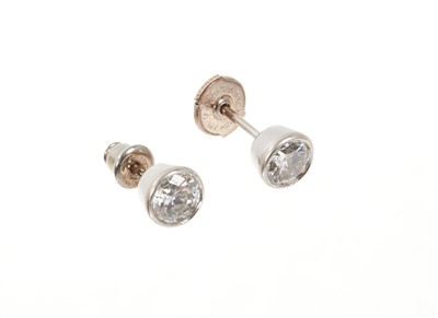 Lot 622 - Pair of diamond single stone stud earrings