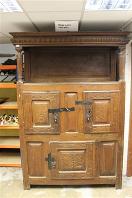 Lot 955 - 17th century style carved oak court cupboard