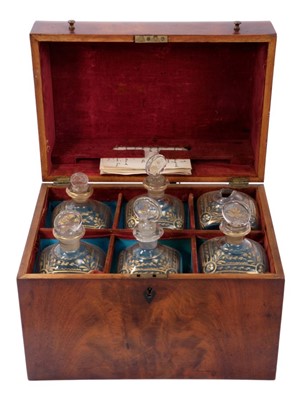 Lot 1197 - Late 18th/early 19th century Continental mahogany decanter box with gilt decorated bottles