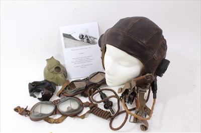 Lot 557 - Early post Second World War RAF leather C Type leather flying helmet, together with two pairs of flight goggles and a radio microphone