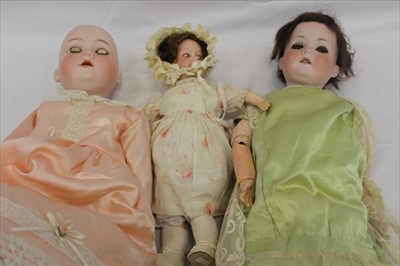 Lot 2704 - Dolls including Armand Marseille Floradora. Bisque head, brown sleeping eyes, open mouth top four teeth showing.