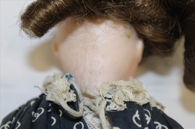 Lot 2706 - Two Dolls including a small French doll SPBJ 60 Paris with composite body and limbs.