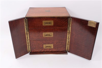 Lot 1196 - Late 19th century brown oak and brass mounted collectors cabinet