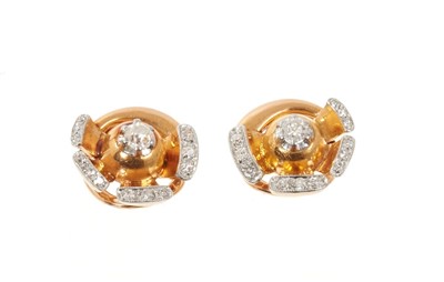 Lot 689 - Pair of diamond and rose gold earrings of stylized rose design, old cut and single cut diamonds in 14ct gold setting with clip fittings