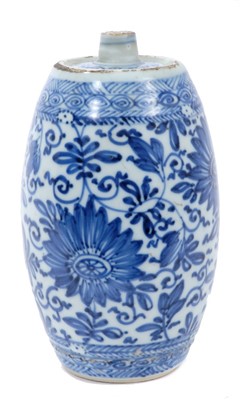 Lot 246 - 18th Century Chinese Blue and White Spirit Bottle, of barrel form, painted with floral patterns, 13cm height.