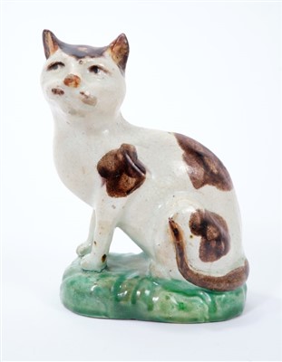 Lot 259 - Rare early 19th century Staffordshire model of a cat