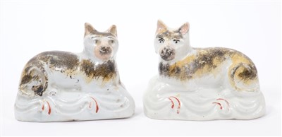 Lot 262 - Good pair of 19th century Staffordshire sponge-decorated models of recumbent cats