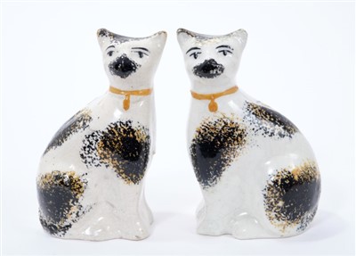 Lot 257 - Mid 19th century pair of Staffordshire cats
