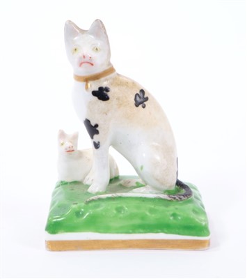 Lot 265 - 19th century English porcelain model of a cat and kitten