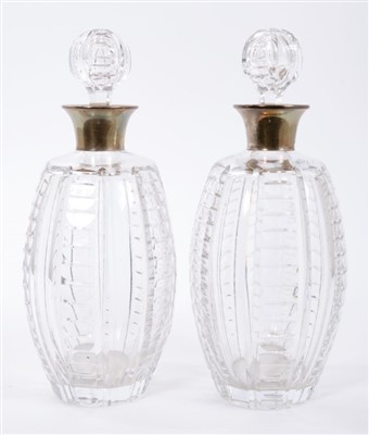 Lot 428 - Pair of silver mounted and cut glass decanters