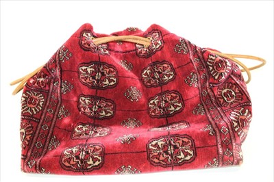 Lot 3083 - A large carpet tote bag with leather handles