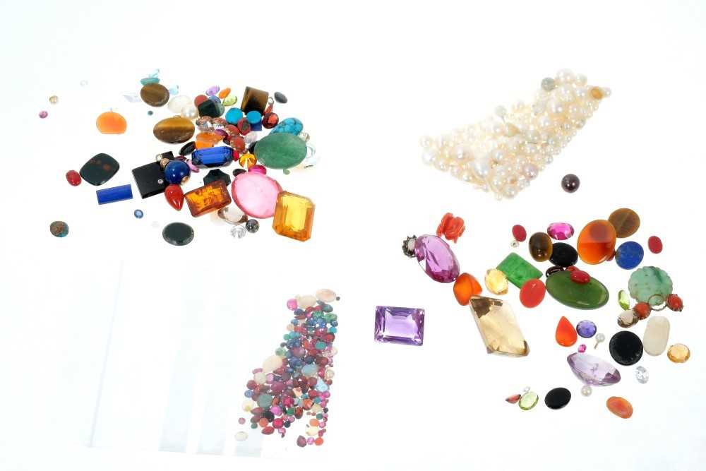 Lot 757 - Four packets of unmounted gemstones to