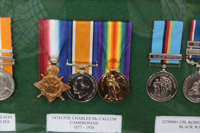 Lot 536 - Group of replica medals mounted in glazed frame, together with badges (3 frames)