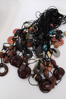 Lot 16 - Collection of carved bone and other beads, quantity glass bead necklaces and other Ethnic jewellery