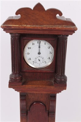 Lot 1259 - 19th century oak pocket watch holder in the form of a miniature longcase clock