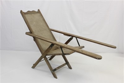 Lot 1727 - 19th century teak and caned planters chair