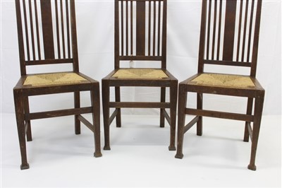 Lot 1721 - Charles Francis Annesley Voysey rare set of three oak and rush chairs with Sotheby's sales catalogue