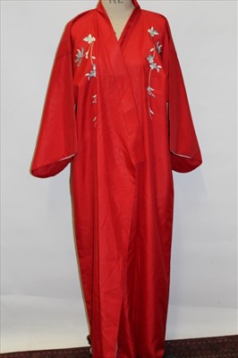 Lot 3061 - Japanese red kimono with chrysanthemum embroidery. Also a pink brocade kimono jacket and a blue silk brocade robe.