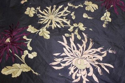 Lot 3063 - Large Chinese embroidered silk cover with satin stitched flowers with forbidden knot stitched centres.  Cotton lining.