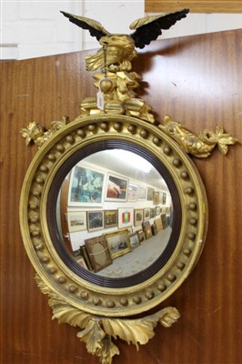 Lot 1625 - Regency gilt gesso convex wall mirror