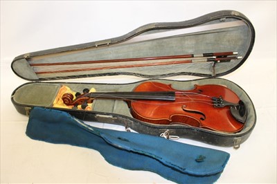 Lot 3863 - A violin with two bows in fitted case