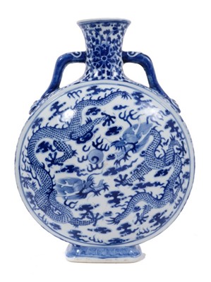 Lot 289 - Chinese blue and white porcelain moon flask, painted with dragons chasing a flaming pearl