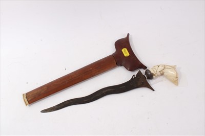 Lot 713 - two African throwing axes and Kris