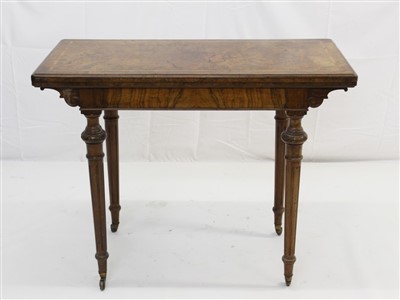 Lot 1675 - Victorian figured walnut card table