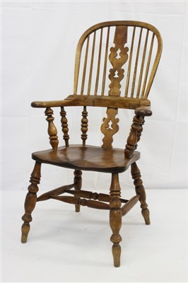 Lot 1672 - Victorian elm Windsor stick back elbow chair on turned legs