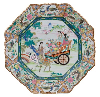 Lot 326 - Late 19th Japanese Porcelain Charger of Octagonal form, decorated in the Famille Rose palette, with figures on a cart .