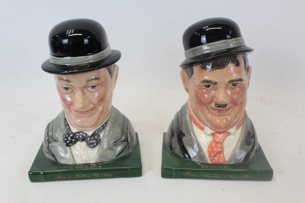 Lot 2038 - Pair of Royal Doulton bookends, modelled as Laurel and Hardy (D7119 and D7120) no. 637 of 2,500
