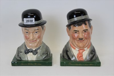 Lot 2038 - Pair of Royal Doulton bookends, modelled as Laurel and Hardy (D7119 and D7120) no. 637 of 2,500