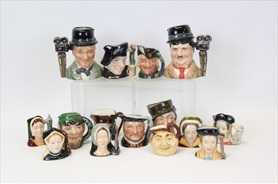 Lot 2041 - Royal Doulton miniature Character jugs, Laurel and Hardy (D7009 and D7008), Sam Weller, Elf D6942, Tam O'Shanter D6640, Henry VIII D6648, Catherine Parr D6752, Catherine of Aragon D6658, Catherine...