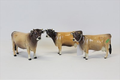 Lot 2046 - Beswick Cattle comprising Dunsley Cowboy and two other Beswick cattle (3)