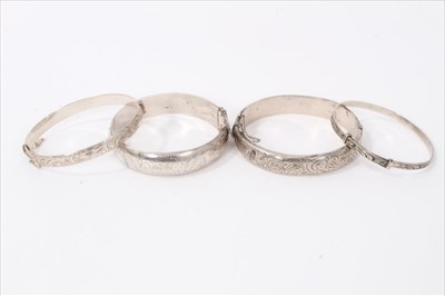 Lot 3226 - Four silver bangles