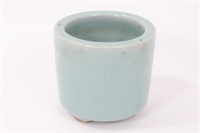 Lot 320 - Chinese celadon glazed brush pot, evenly covered in a light blue glaze